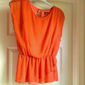 Cute orange and grey top.  Perfect